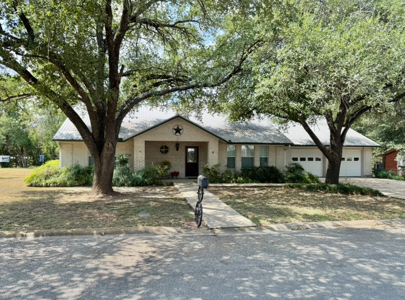 608 Mogonye Lane Elgin, TX 78621 - Photo 2 of 38 a front view of a house with a yard