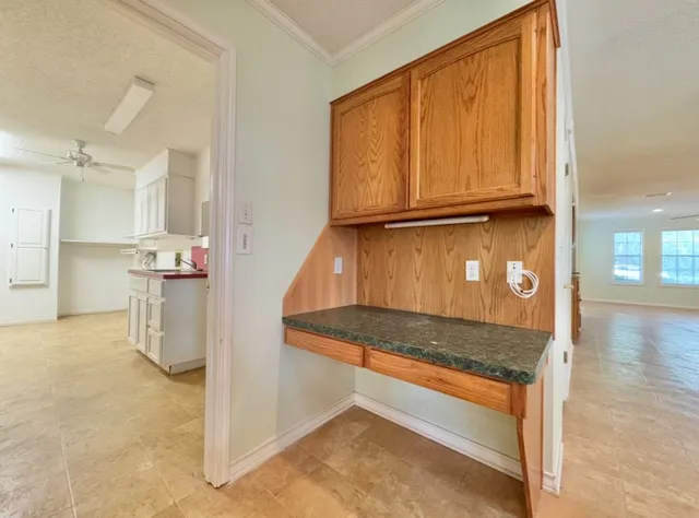 an empty room with closet area