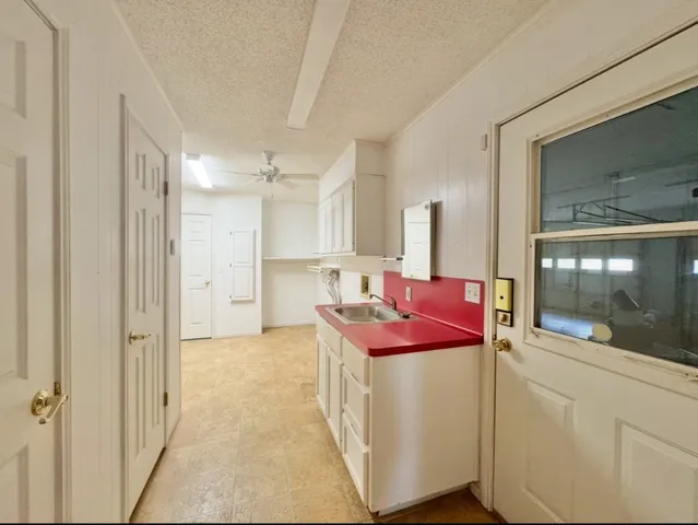 a bathroom with a sink and a bathtub