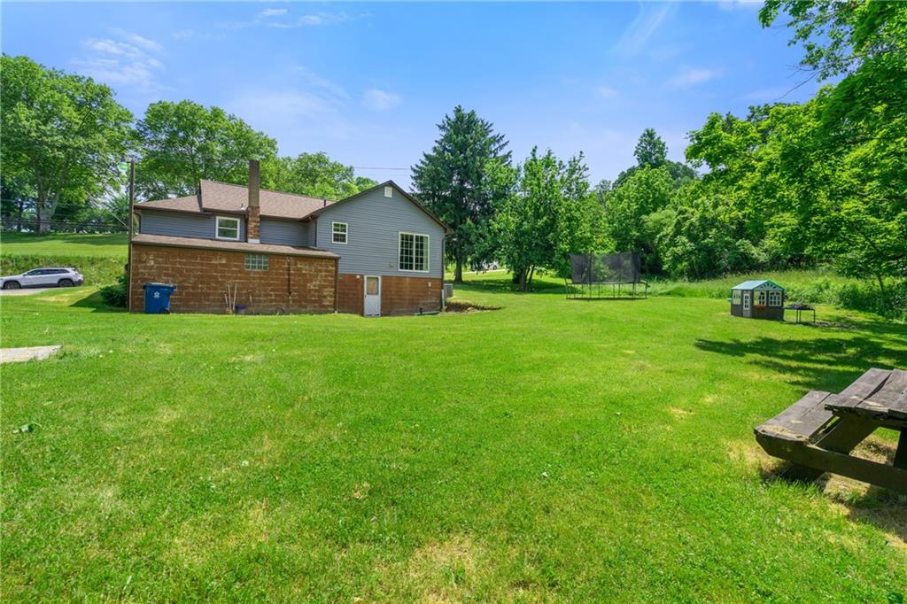 635 Center New Texas Road Pittsburgh, PA 15239 - Photo 21 of 22 a view of a house with a yard porch and sitting area