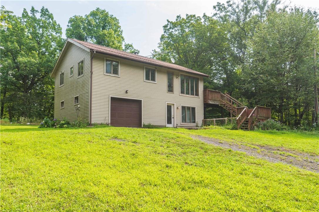 2481 Rte 9W Saugerties, NY 12477 - Photo 1 of 1 a front view of a house with a garden