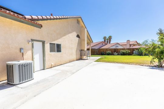 624 Pinon Court Ridgecrest, CA 93555 - Photo 46 of 46 a view of a house with a yard and garage