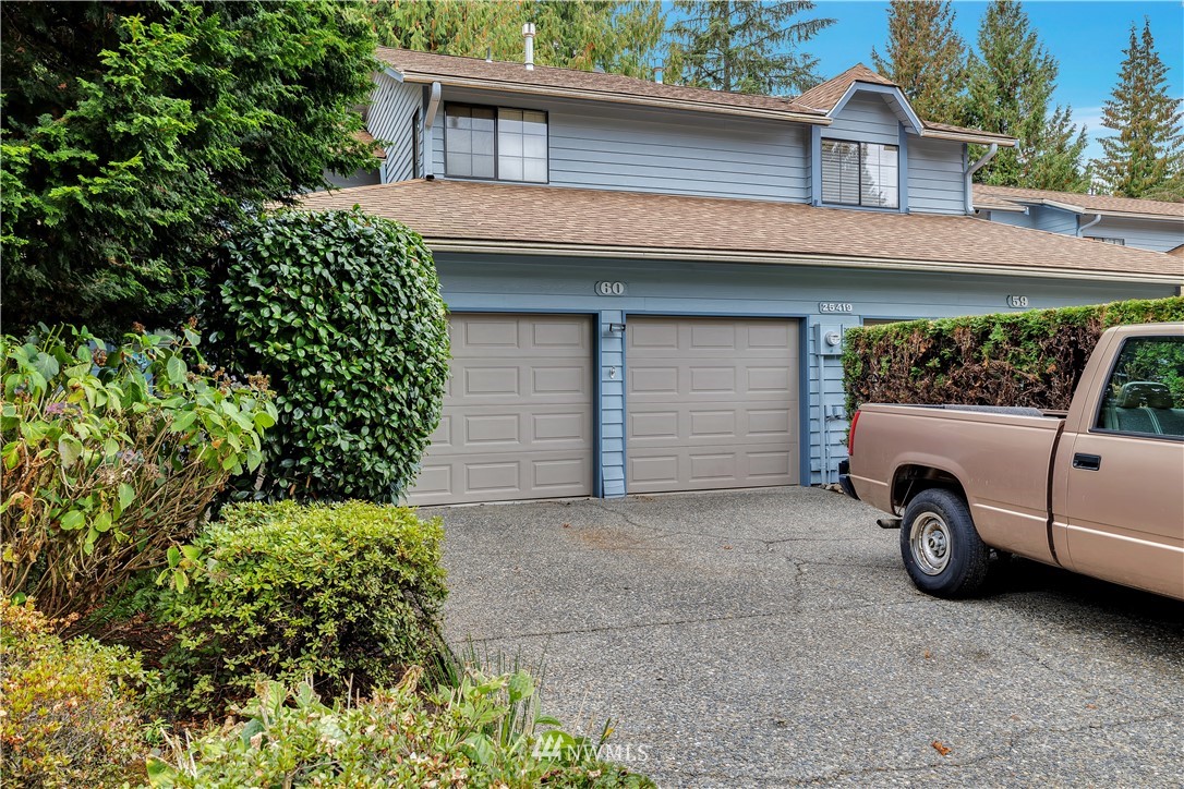25419 213th Place Southeast, Unit 60 Maple Valley, WA 98038 - Photo 21 of 27 a blue house with outdoor space