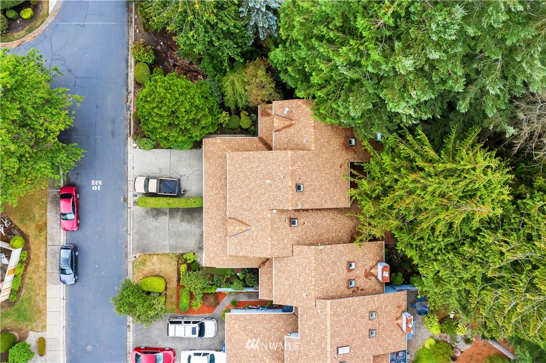 25419 213th Place Southeast, Unit 60 Maple Valley, WA 98038 - Photo 22 of 27 an aerial view of a house with a yard and fountain