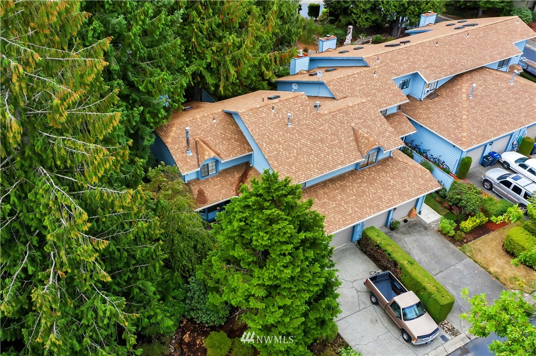 25419 213th Place Southeast, Unit 60 Maple Valley, WA 98038 - Photo 24 of 27 an aerial view of a house with garden space and street view