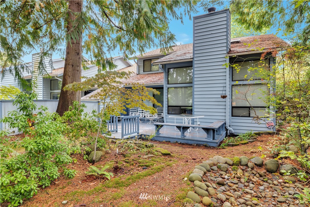 25419 213th Place Southeast, Unit 60 Maple Valley, WA 98038 - Photo 5 of 27 a view of a house with a yard
