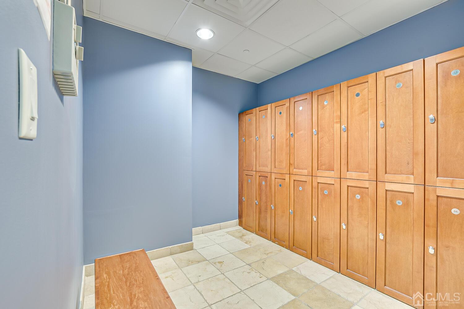 1 Spring Street, Unit 1806 New Brunswick, NJ 08901 - Photo 46 of 57 a view of a room with a wooden walls