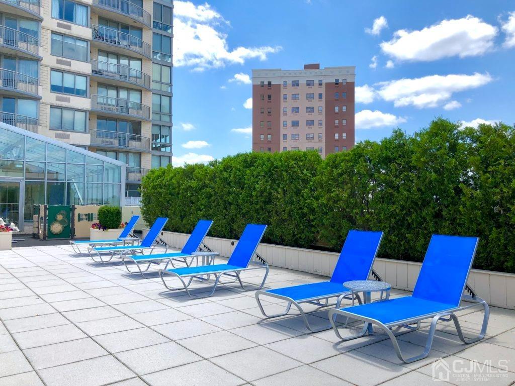 1 Spring Street, Unit 1806 New Brunswick, NJ 08901 - Photo 54 of 57 a view of outdoor space with seating