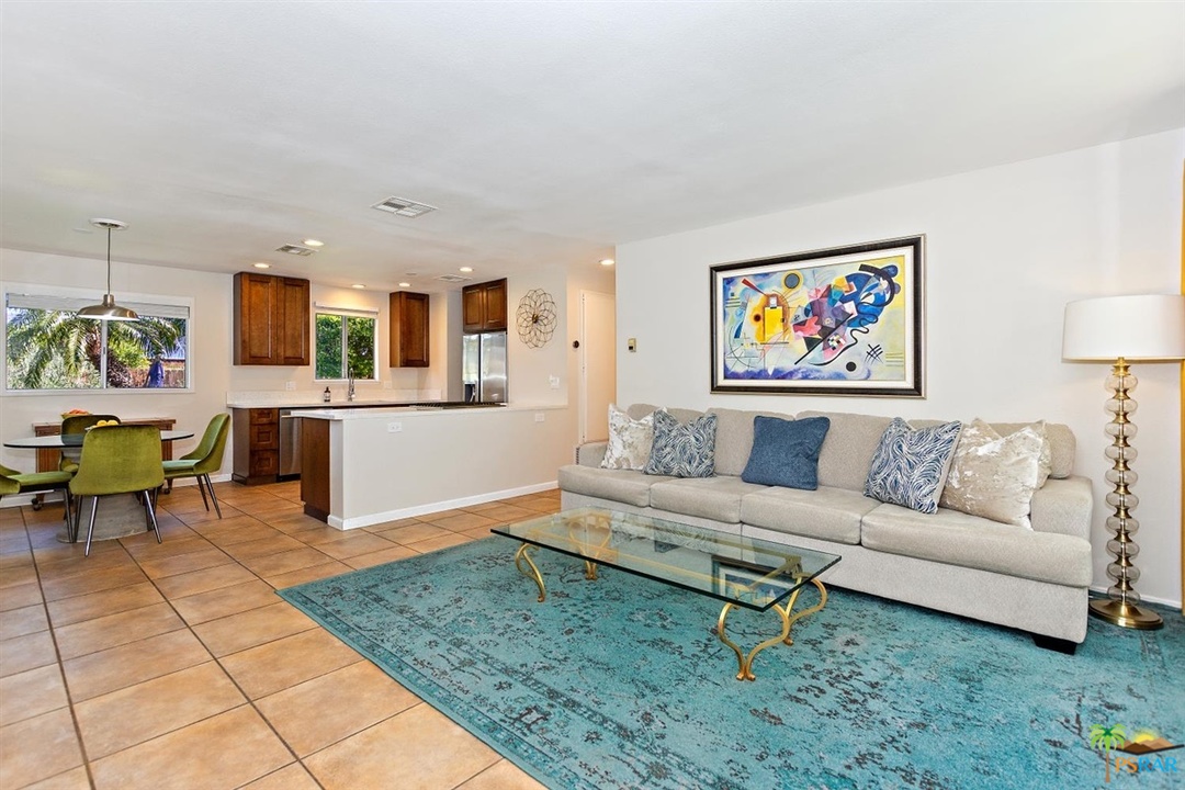 2802 North Chuperosa Road Palm Springs, CA 92262 - Photo 1 of 25 a living room with furniture and kitchen view