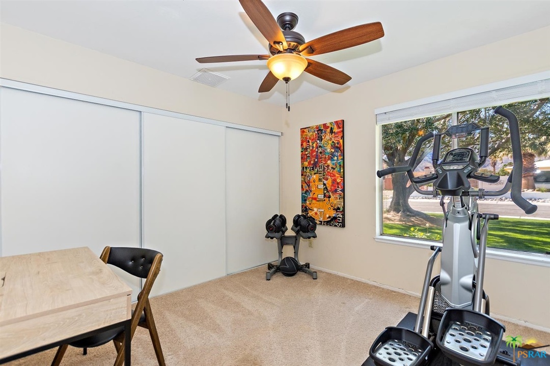 2802 North Chuperosa Road Palm Springs, CA 92262 - Photo 11 of 25 a room with furniture and a window