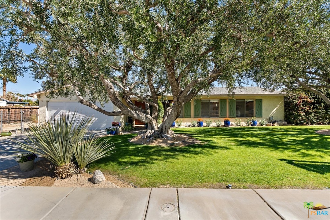 2802 North Chuperosa Road Palm Springs, CA 92262 - Photo 24 of 25 a front view of a house with a garden
