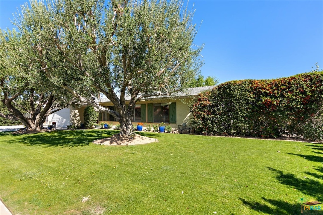 2802 North Chuperosa Road Palm Springs, CA 92262 - Photo 25 of 25 a view of a house with a yard and sitting area
