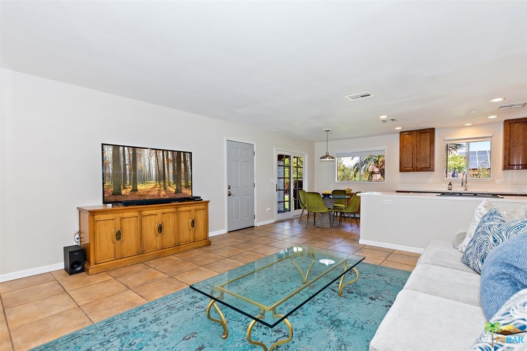 2802 North Chuperosa Road Palm Springs, CA 92262 - Photo 3 of 25 a living room with furniture and a table