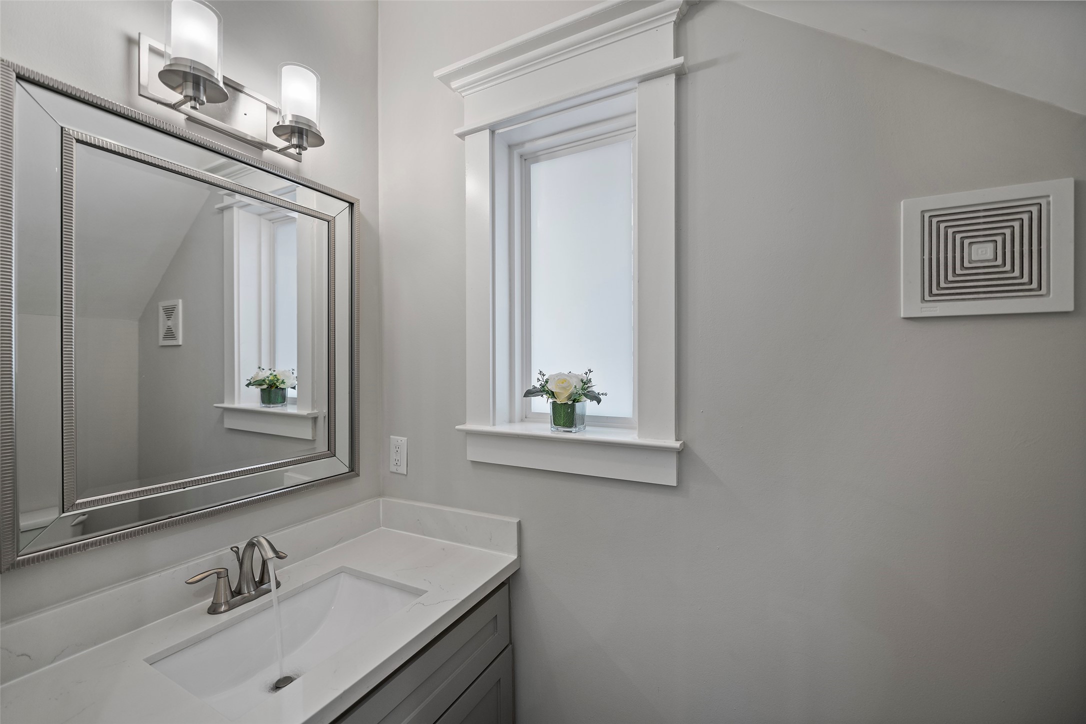 6533 Castlebay Drive Houston, TX 77092 - Photo 14 of 50 a bathroom with a sink vanity and a mirror