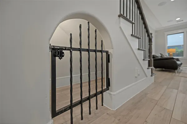 a view of entryway with wooden floor and stairs
