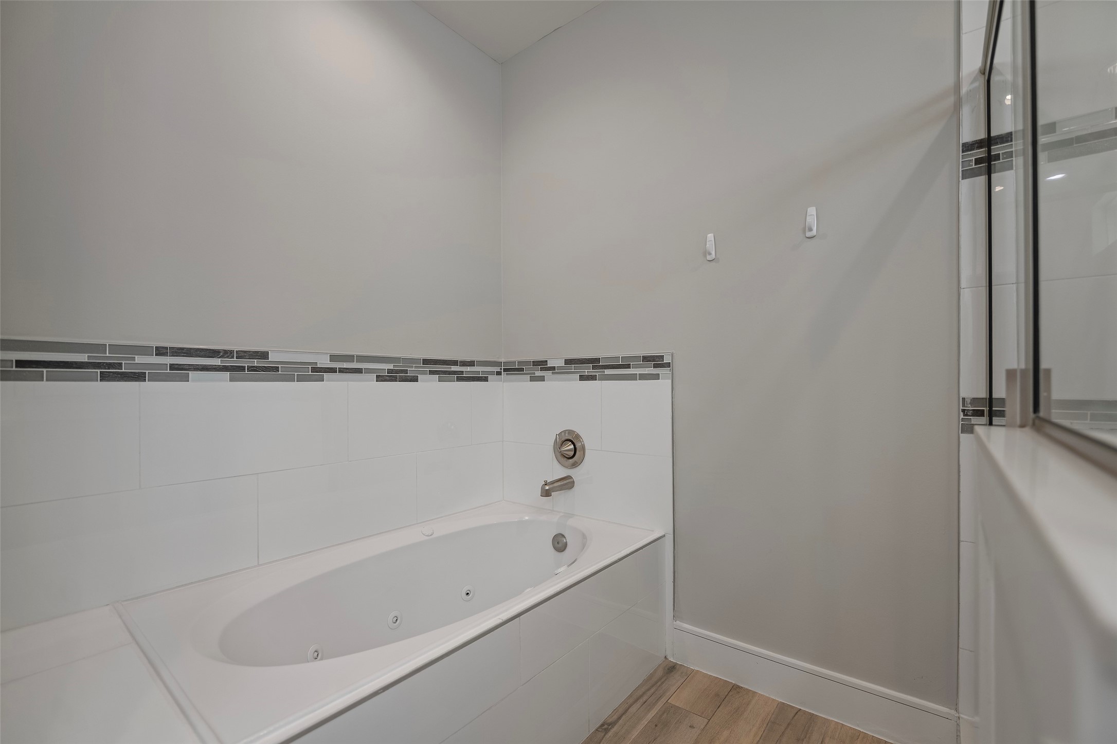 6533 Castlebay Drive Houston, TX 77092 - Photo 28 of 50 a bathroom with a bathtub