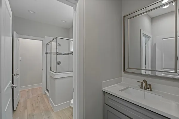 a bathroom with a sink and mirror