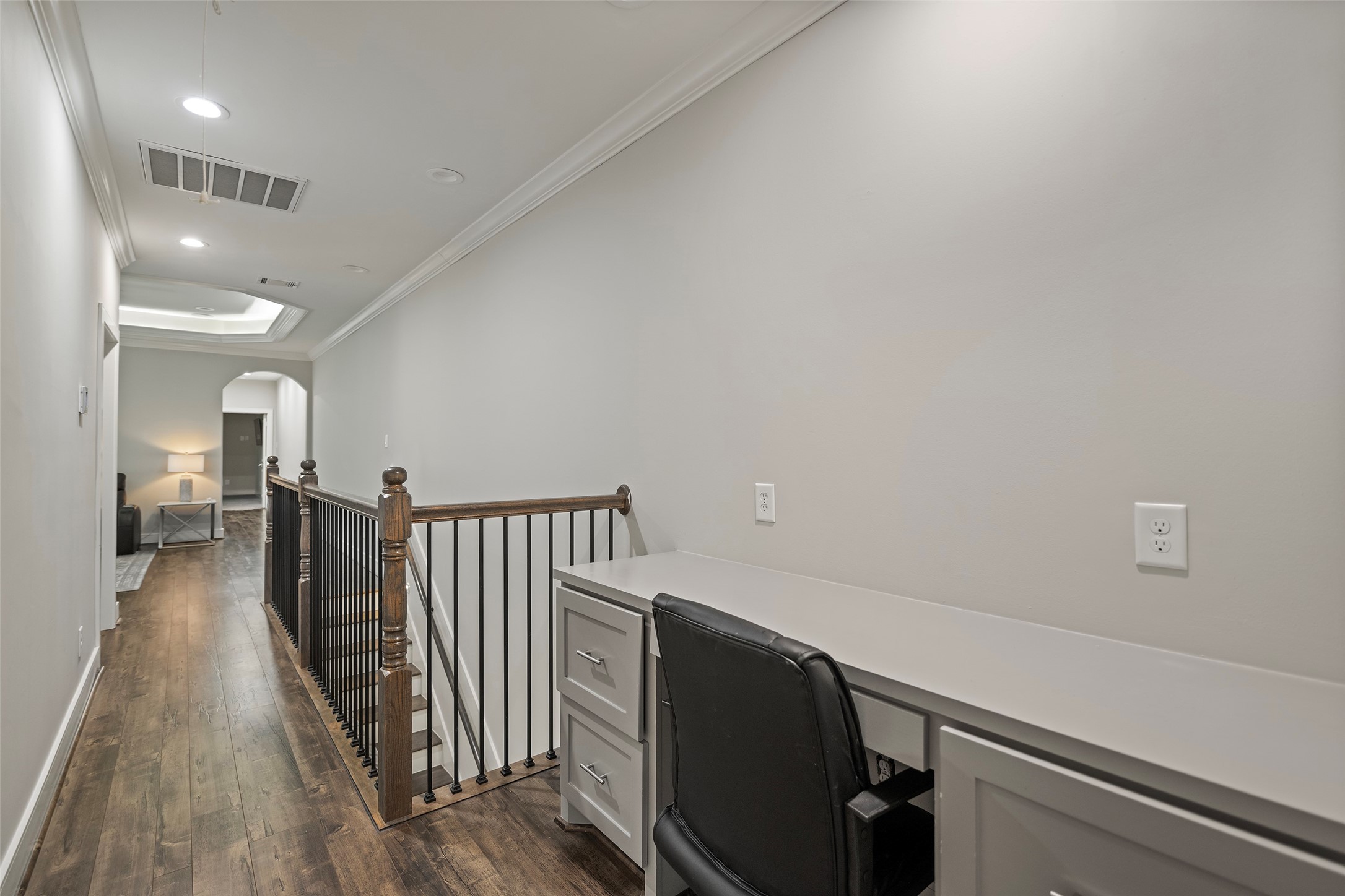 6533 Castlebay Drive Houston, TX 77092 - Photo 42 of 50 a view of a hallway with wooden floor