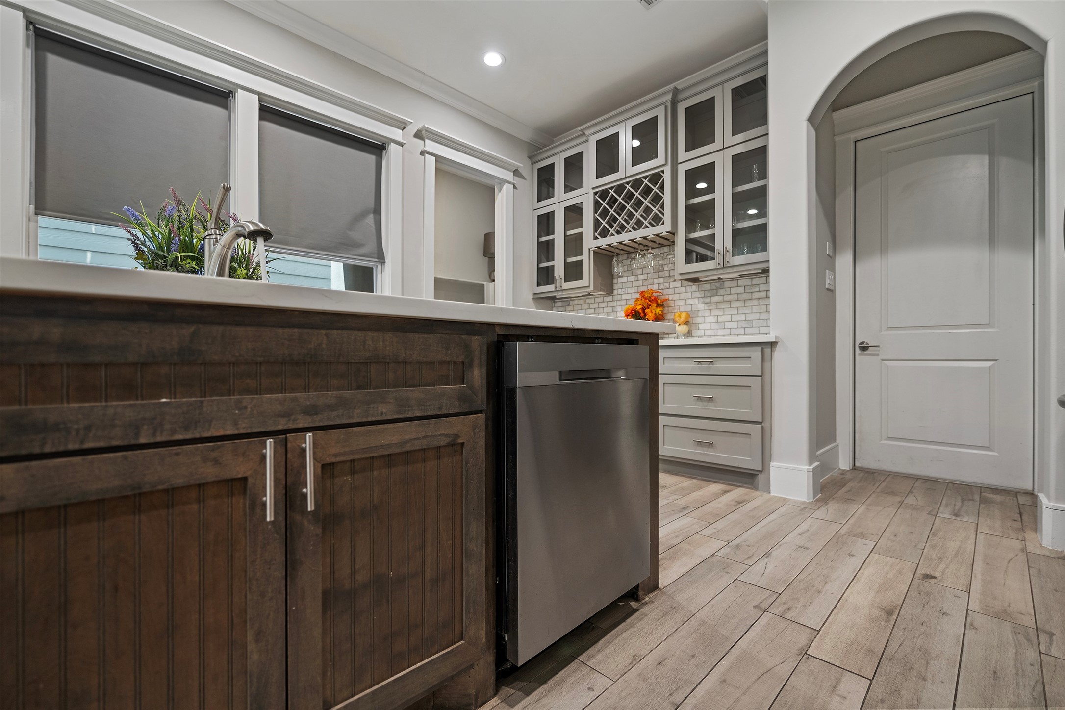 6533 Castlebay Drive Houston, TX 77092 - Photo 7 of 50 a kitchen with a refrigerator and sink