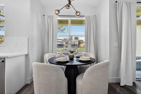 a bedroom with a large bed and a flat screen tv