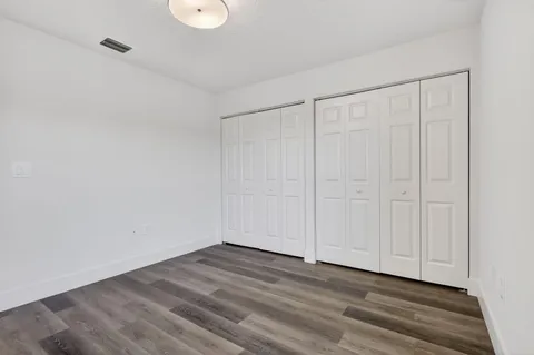 a bathroom with a bathtub and a toilet