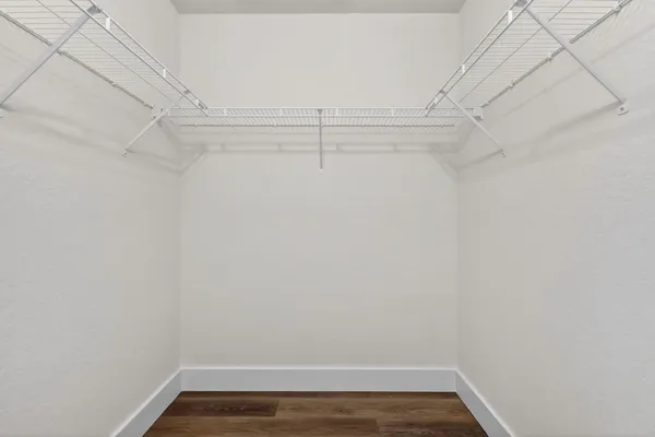 an aerial view of residential houses with outdoor space and street view