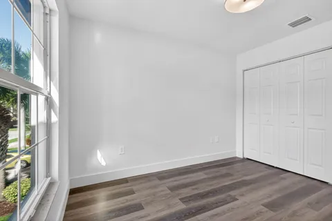 a view of a fountain in front of a house