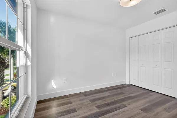 a view of a fountain in front of a house