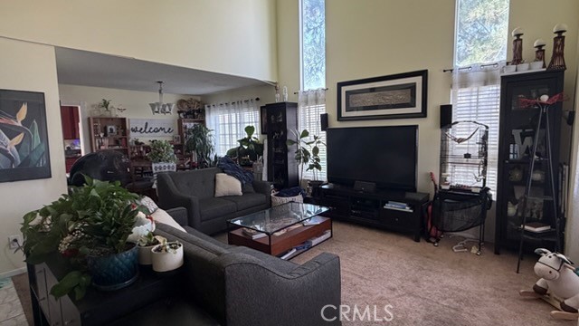 2478 KOA Drive Rialto, CA 92377 - Photo 15 of 18 a living room with furniture fireplace and flat screen tv
