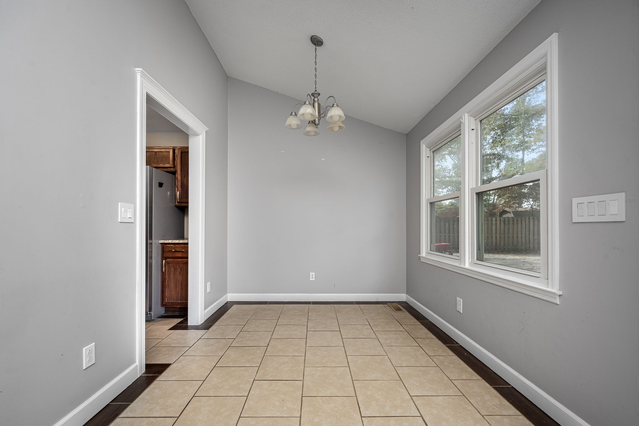 104 Dove Hollow Road Tullahoma, TN 37388 - Photo 11 of 37 a view of an empty room with a window