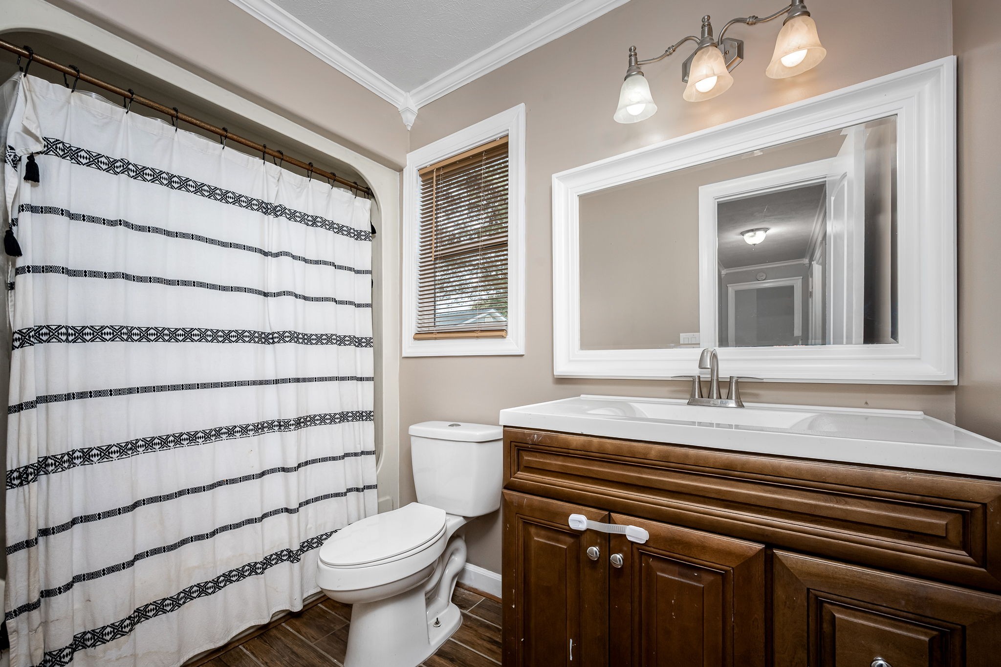 104 Dove Hollow Road Tullahoma, TN 37388 - Photo 23 of 37 a bathroom with a sink vanity mirror and toilet