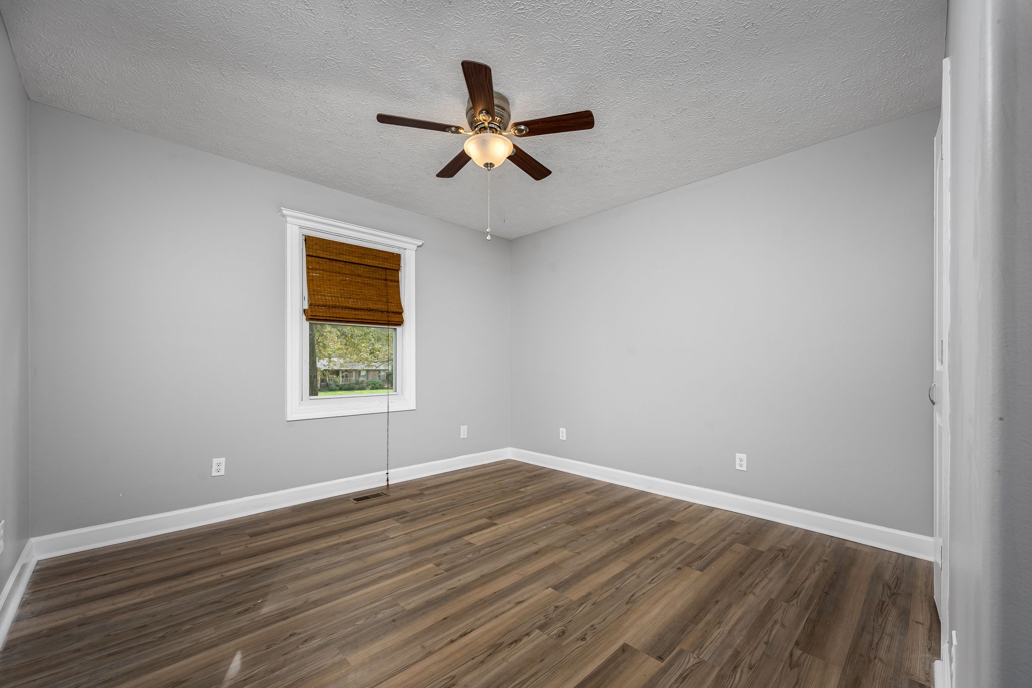 104 Dove Hollow Road Tullahoma, TN 37388 - Photo 25 of 37 wooden floor in an empty room with a window