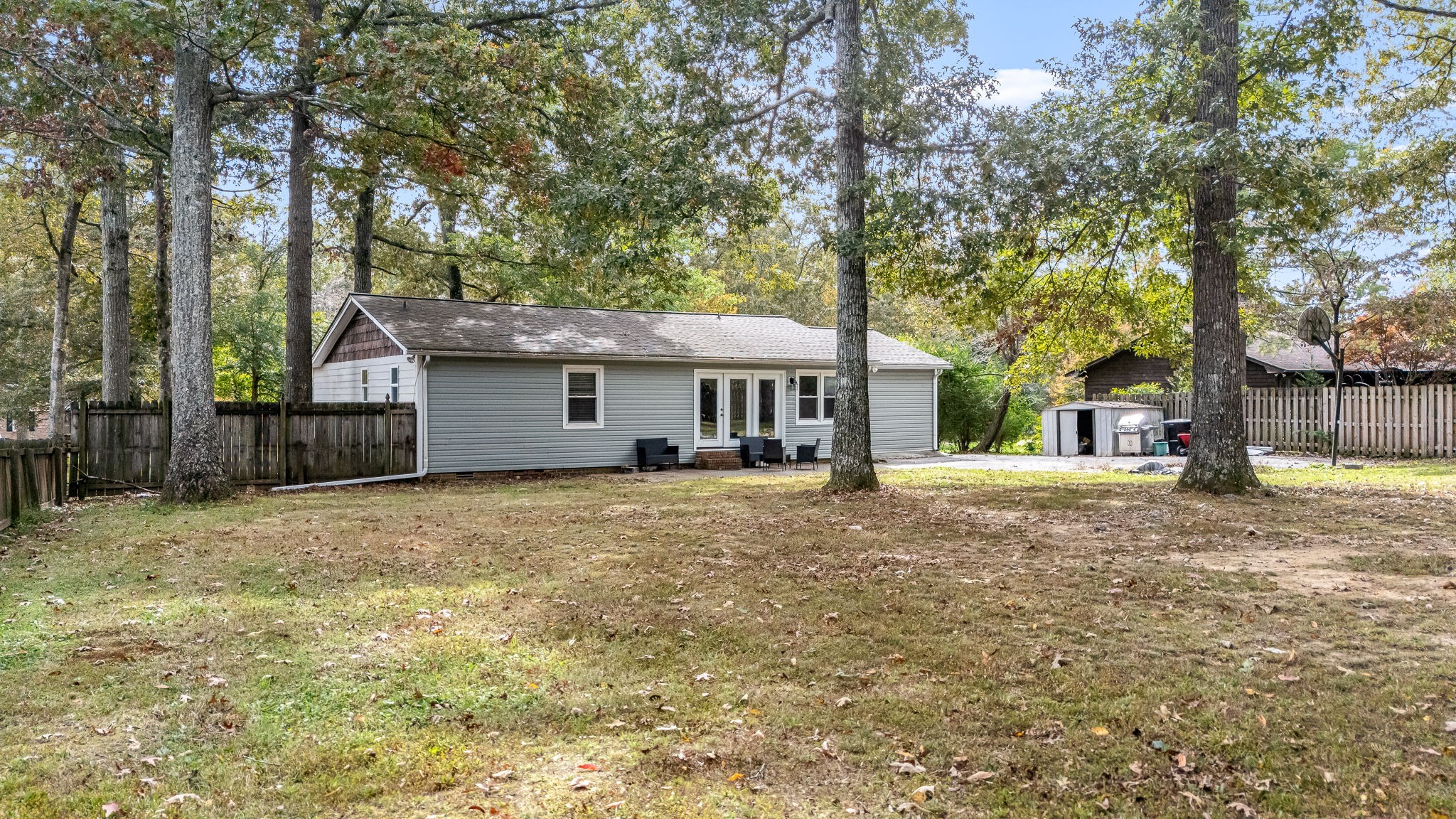 104 Dove Hollow Road Tullahoma, TN 37388 - Photo 31 of 37 a front view of a house with a garden and tree