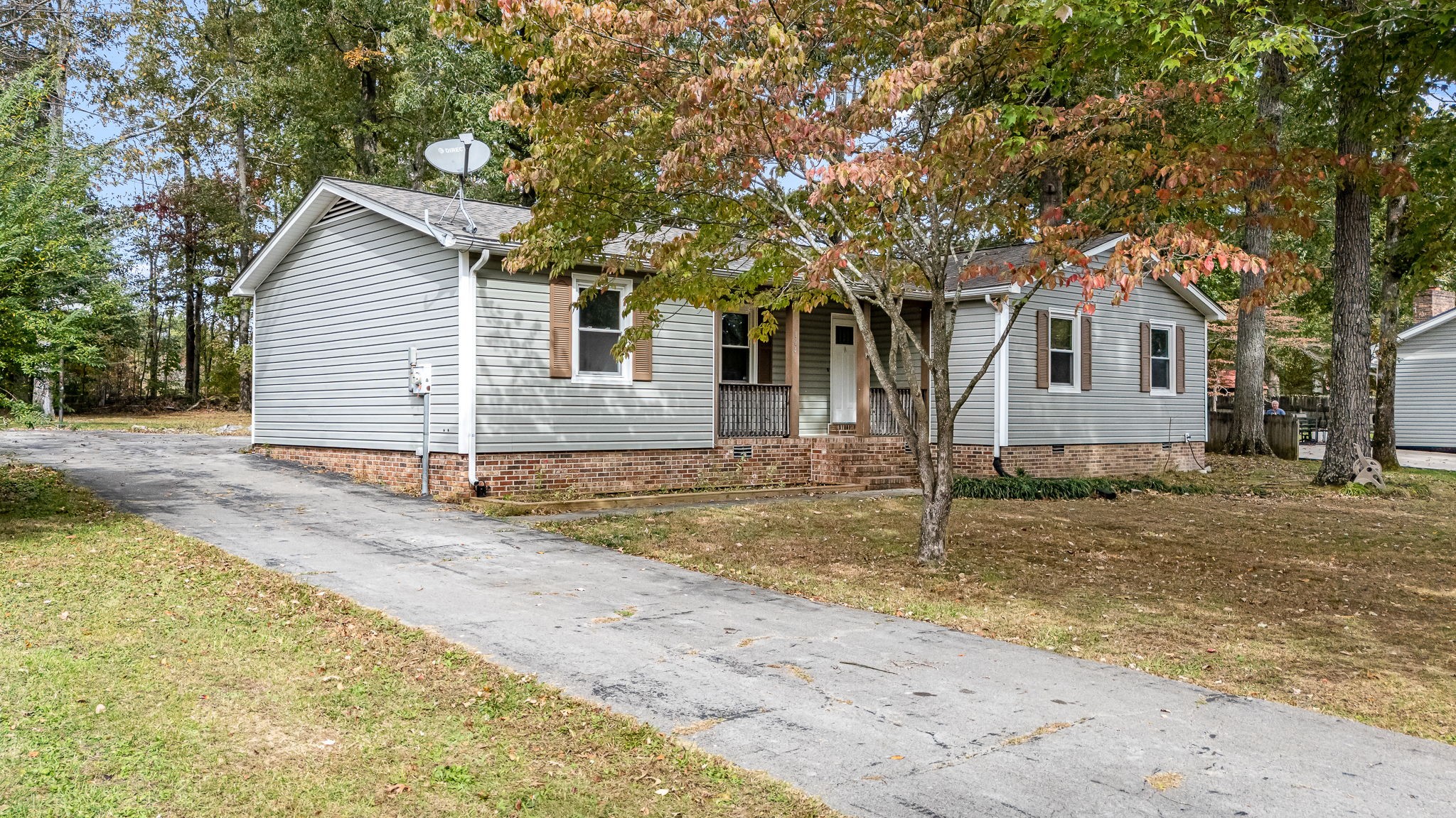 104 Dove Hollow Road Tullahoma, TN 37388 - Photo 34 of 37 a front view of a house with a yard and garage