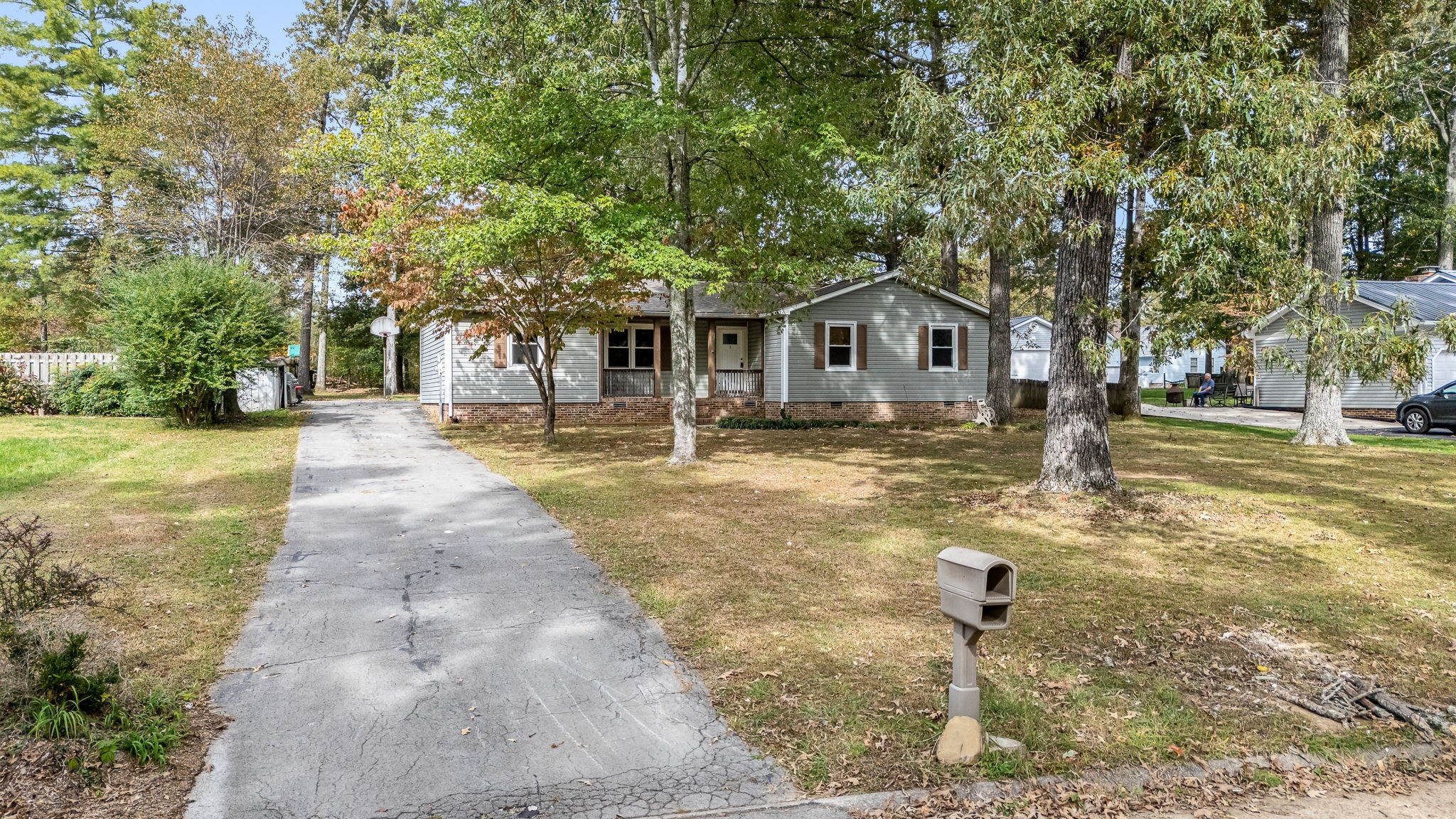 104 Dove Hollow Road Tullahoma, TN 37388 - Photo 36 of 37 a front view of a house with a yard and trees