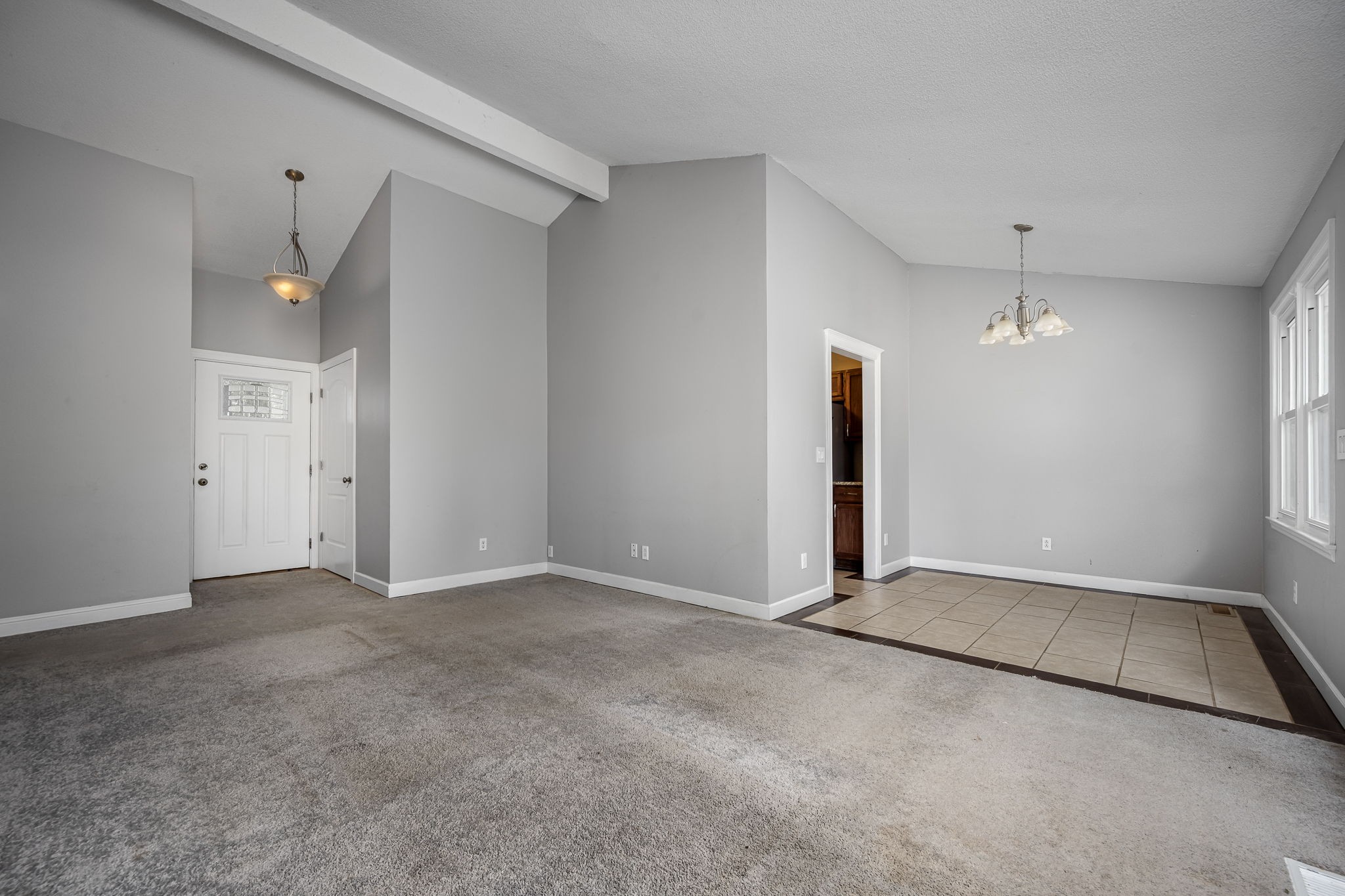 104 Dove Hollow Road Tullahoma, TN 37388 - Photo 8 of 37 a view of an empty room with a window