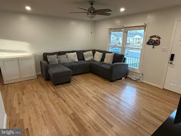 a spacious bedroom with a bed and furniture