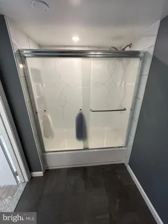 a room with furniture and a fireplace