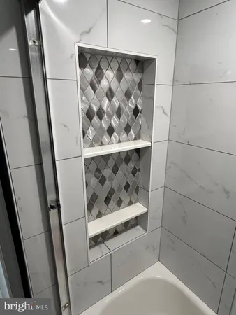 a kitchen with stainless steel appliances granite countertop a stove sink and cabinets