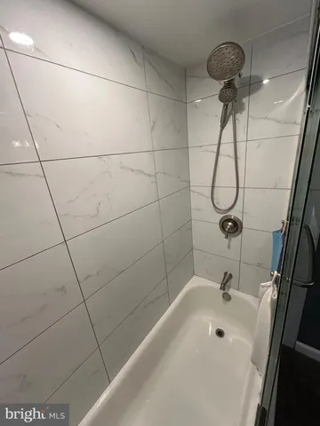 a view of a house with backyard and wooden floor