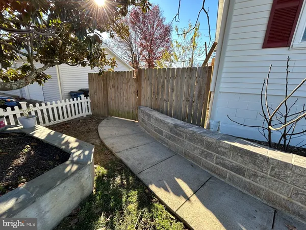 a kitchen with stainless steel appliances granite countertop a refrigerator stove and microwave