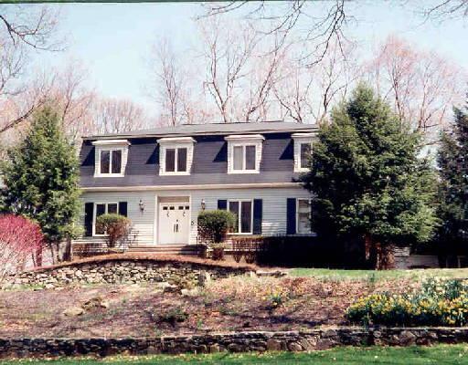 4 High Valley Road Ridgefield, CT 06877 - Photo 1 of 1 a front view of a house with yard