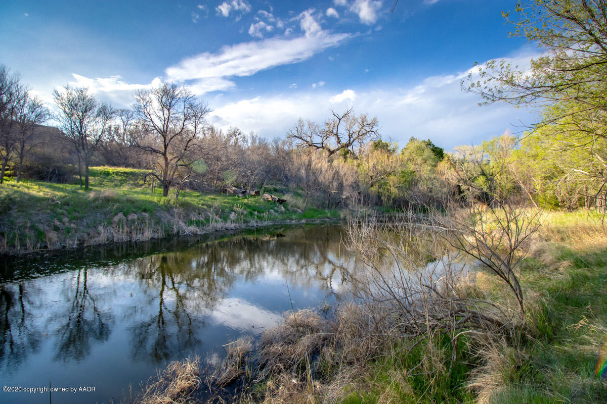 West Mcafee Road Canyon, TX 79118 - Photo 25 of 39 a view of a lake in between two chairs