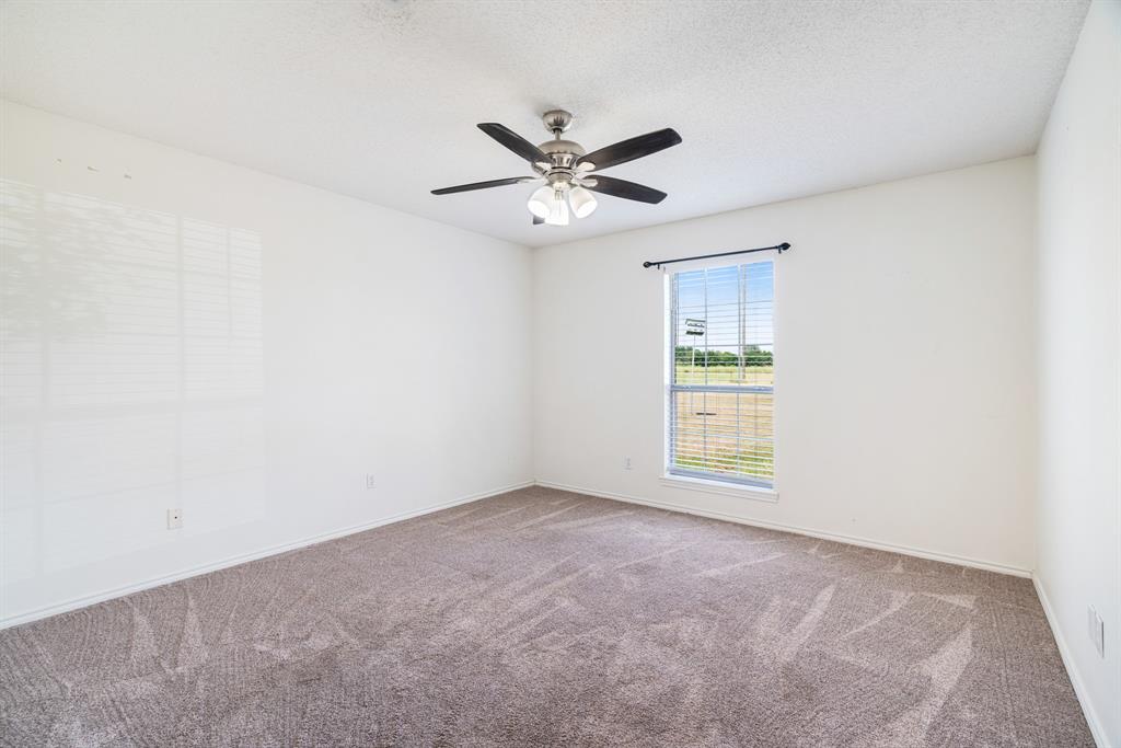 201 Farm To Market 906 Powderly, TX 75473 - Photo 21 of 32 a view of an empty room with a window