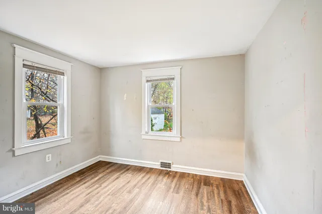 a view of livingroom with furniture and wooden floor