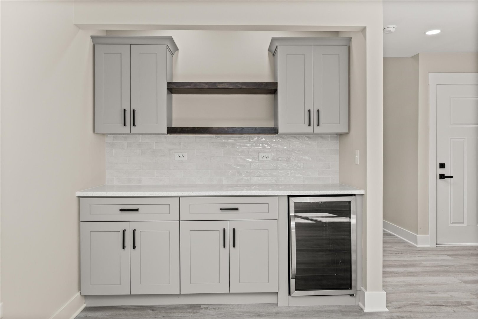 120 Kevin Drive Diamond, IL 60416 - Photo 11 of 24 a kitchen with white cabinets and white appliances