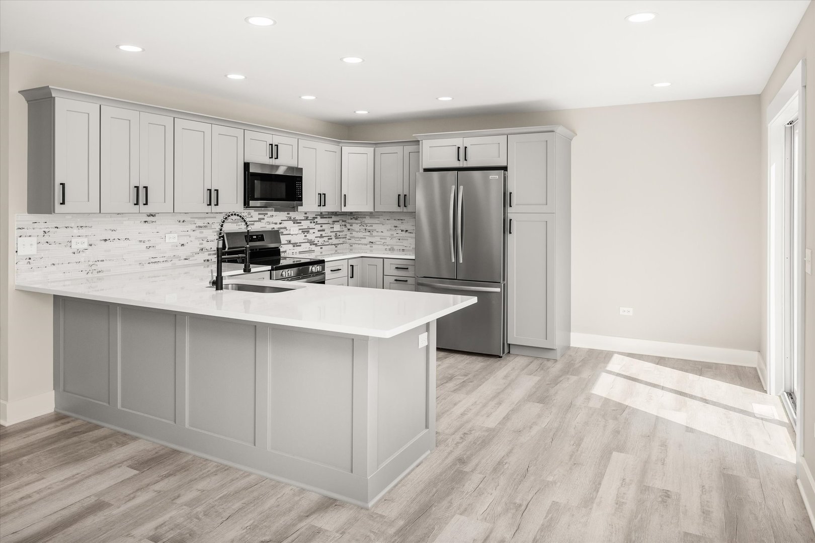 120 Kevin Drive Diamond, IL 60416 - Photo 14 of 24 a kitchen with kitchen island a sink stainless steel appliances and cabinets