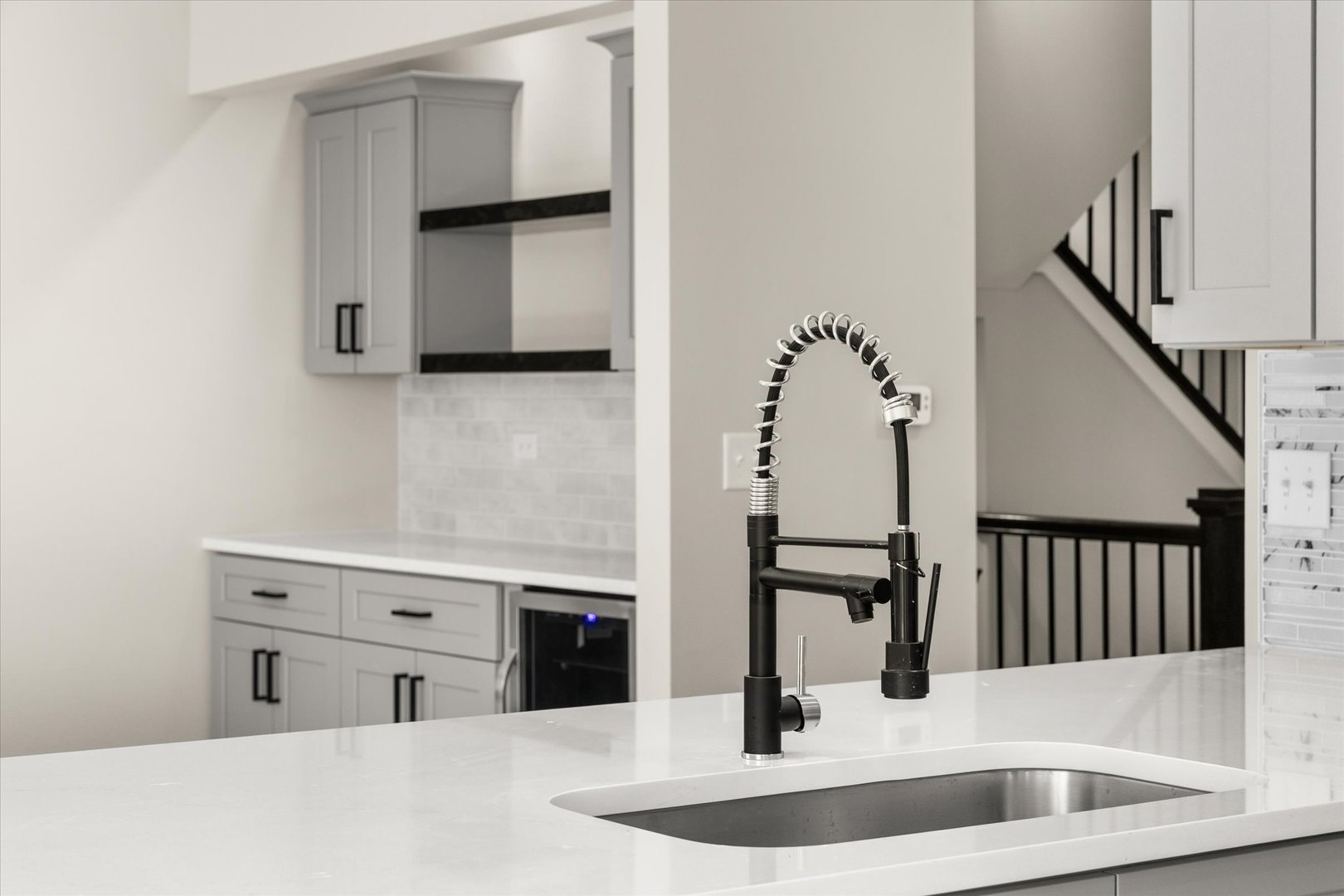 120 Kevin Drive Diamond, IL 60416 - Photo 17 of 24 a kitchen with kitchen island a stove and a sink with wooden floor