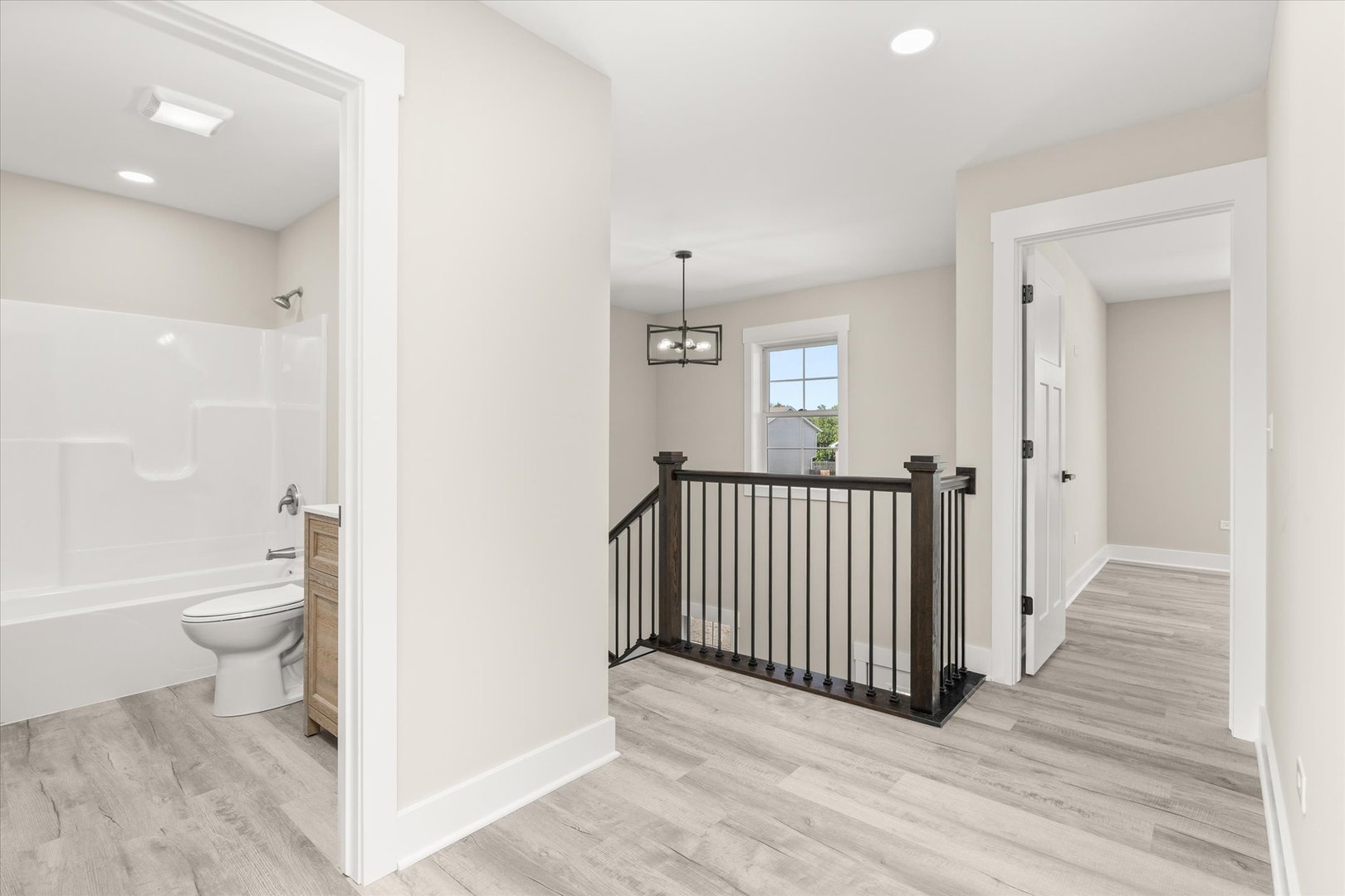 120 Kevin Drive Diamond, IL 60416 - Photo 19 of 24 a view of a bathroom from a hallway
