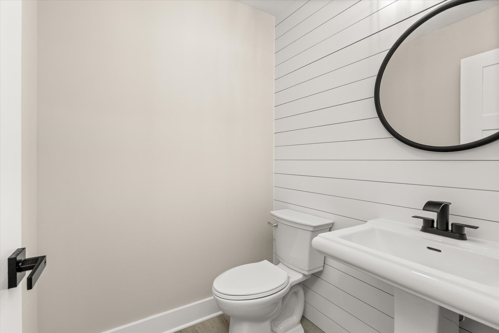 120 Kevin Drive Diamond, IL 60416 - Photo 7 of 24 a bathroom with a toilet a sink and mirror